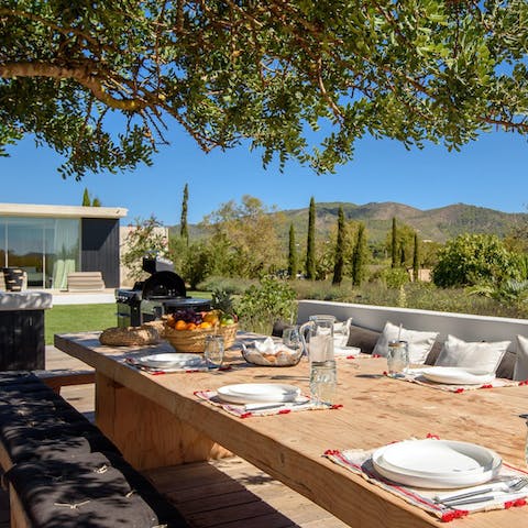 Gather around the outdoor dining table for a private chef-catered dinner