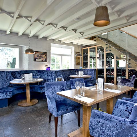 Tuck into locally sourced seasonal fare at on-site restaurant, The Coach House