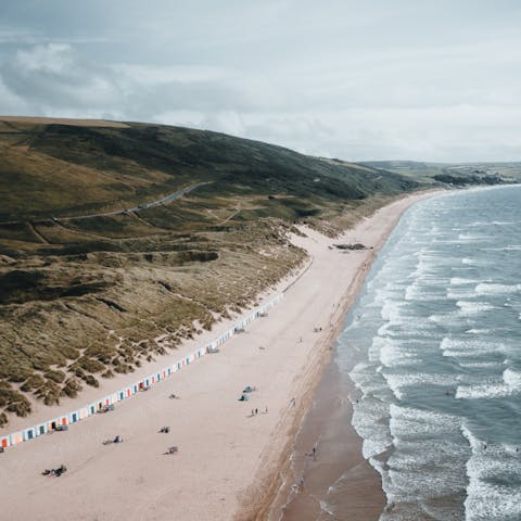Explore the dunes or hit the surf at Woolacombe's award-winning beach