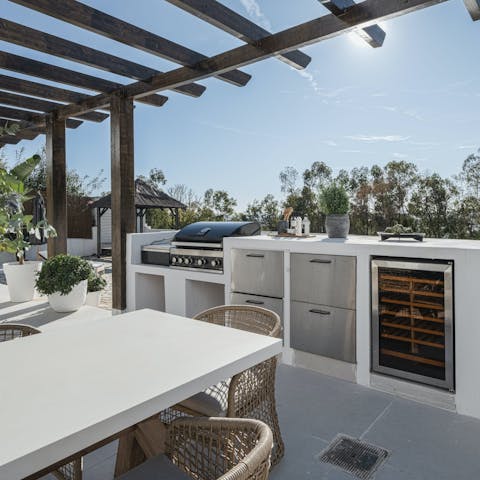 Grill up a family feast in the outdoor kitchen