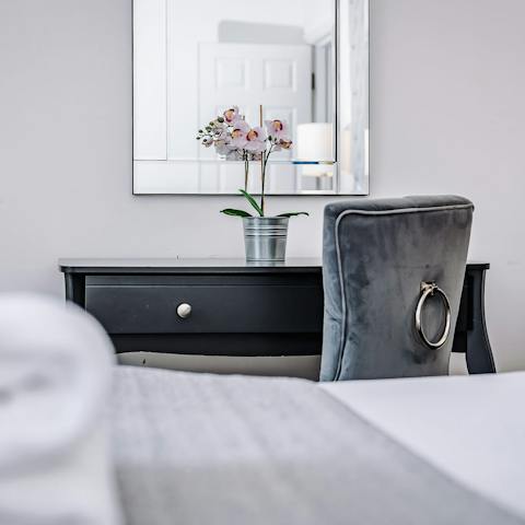 Get some work done at the desk in the main bedroom – it can also be used as a vanity