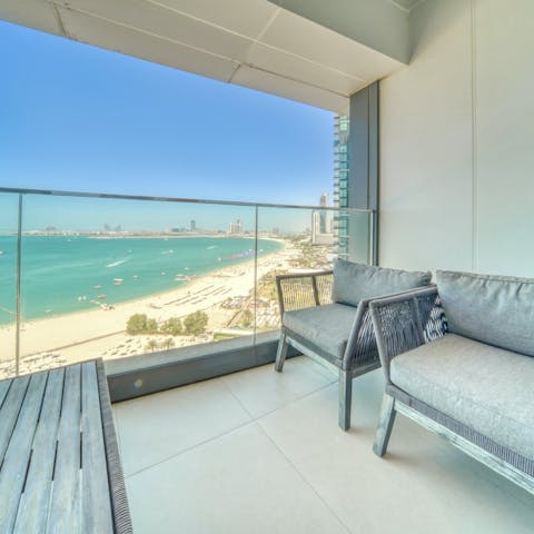 Soak up picturesque views over the gulf on the private balcony
