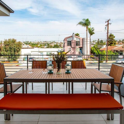 Dine in the balmy Cali air on your private terrace