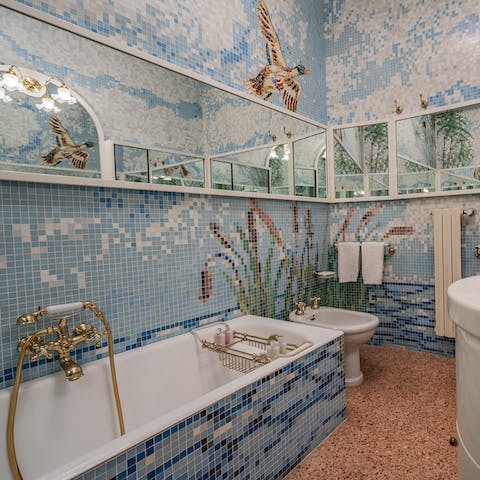 Unwind in the opulent bathtub amidst its quirky Venetian designs