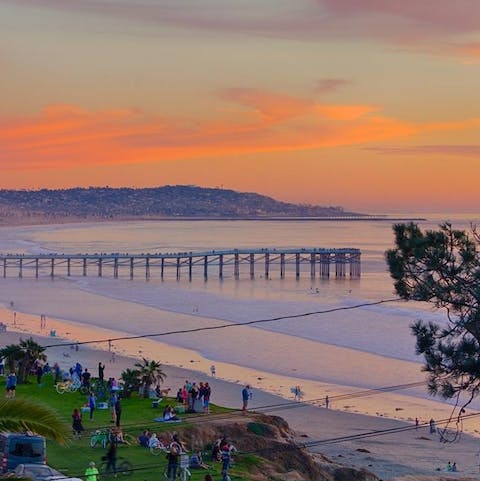 Join the locals on the beach as the sun goes down and enjoy unforgettable views