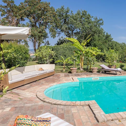 Soak up the Italian rays poolside as you recline with a chilled wine in hand