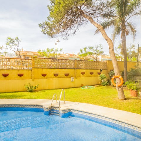 Take a dip in the shared swimming pool, open from June to September