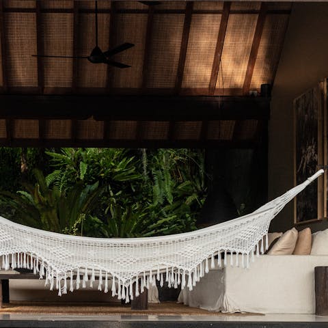 Enjoy lazy evenings swaying in the hammock 