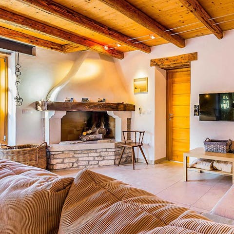 Relax among the rustic features and soft furnishings