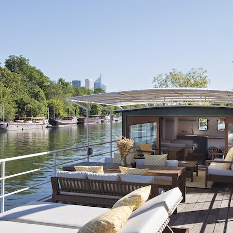 Take in the serene River Seine views from the deck
