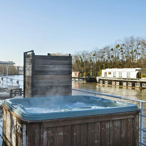 Enjoy a glass of Champagne as you relax in the hot tub