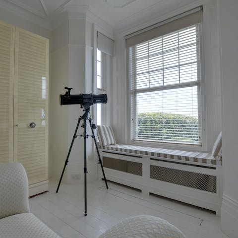 Peer through the telescope and admire the sea views from the main bedroom