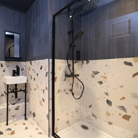 Get ready in the bathroom with its terrazzo-style tiles before heading to a local restaurant