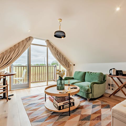 Get cosy and enjoy beautiful views from the living room