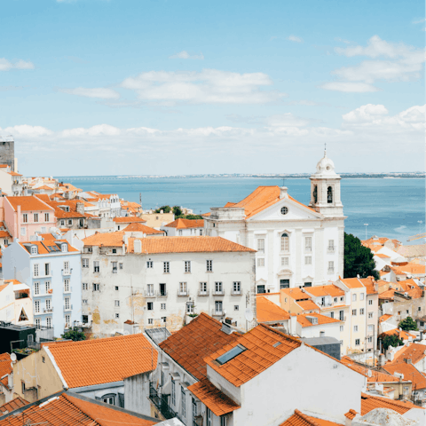 Drive up to the city of Lisbon for a day filled with culture, good food and sunshine