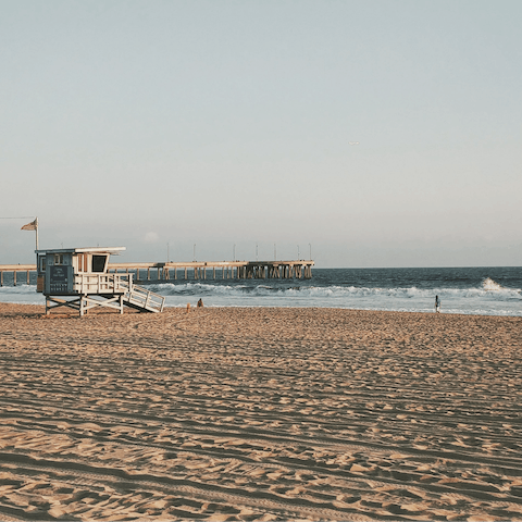 Spend the day on the powdery sands of Venice Beach, a twenty-minute drive from your apartment