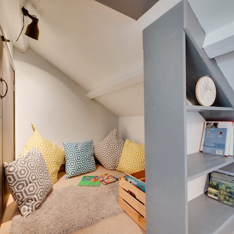 Let the kids entertain themselves in their own cosy hideaway, complete with books and games