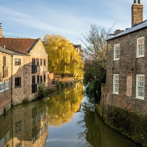 Watch the River Foss flow by right outside your door