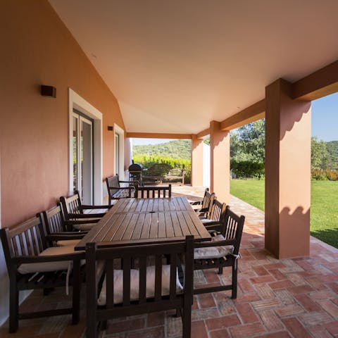 Enjoy leisurely breakfasts on your shaded, natural stone terrace