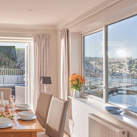 Gather together for a meal in the dining room while watching the boats sailing by in Dartmouth Harbour below