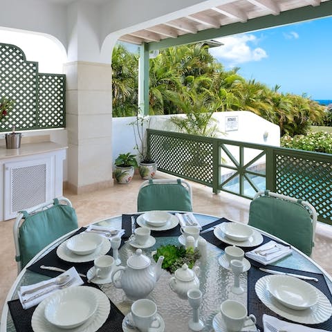 Entertain on the covered terrace – there's even a gas grill when you're in the mood for a barbecue