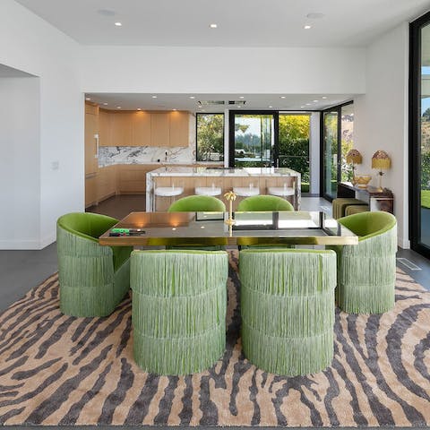 Share delicious feasts in the vibrantly gorgeous dining area
