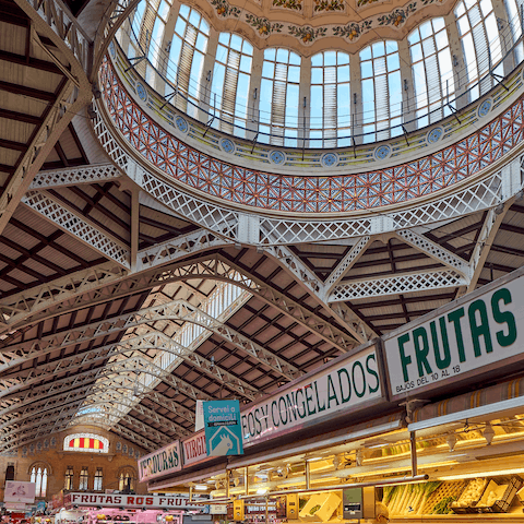 Pick up local produce at the Central Market of Valencia, a short walk away