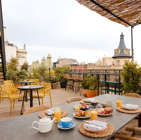 Enjoy a seasonal Mediterranean breakfast at the communal rooftop restaurant