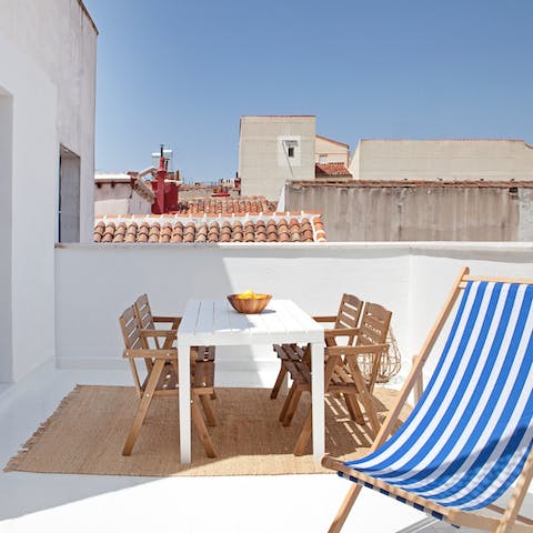 Dine with a view of Madrid's rooftops on your private terrace