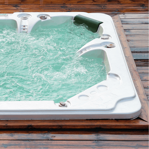 Hire a hot tub and take a dip under the stars