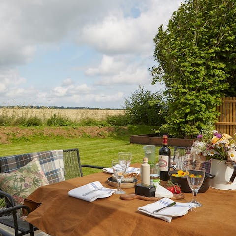 Enjoy barbecues in the private garden, overlooking the rolling countryside