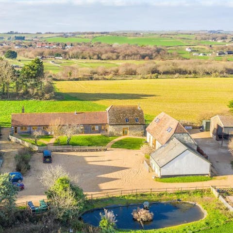 Stay on a country farm, a ten-minute walk from the village of Godshill