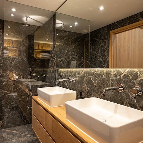 Pamper yourself in the stylish bathrooms