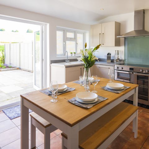 Open up the kitchen to blend the outdoor space with the indoors