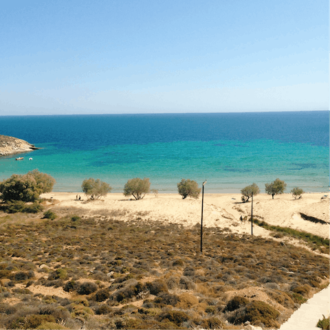 Hop in the car and reach the golden sands of Agios Ioannis in under ten minutes