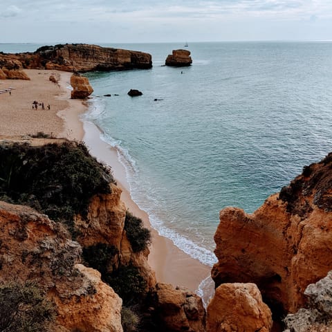 Visit the former fishing village of Albufeira, with its stunning coastline & vibrant nightlife
