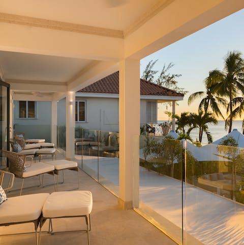 Take a glass of wine up to the balcony and soak in the warm rays of the setting sun