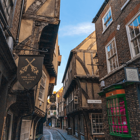 Visit the medieval streets of The Shambles, a nine-minute walk away