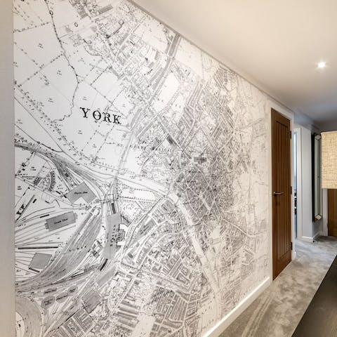 Study the intriguing mural in the hallway – a historic map of York