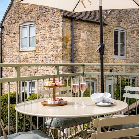 Walk to a local pub or savour drinks on the little balcony 