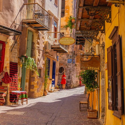 Wander the vibrant, authentic streets of Chania (a thirty-six-minute drive)