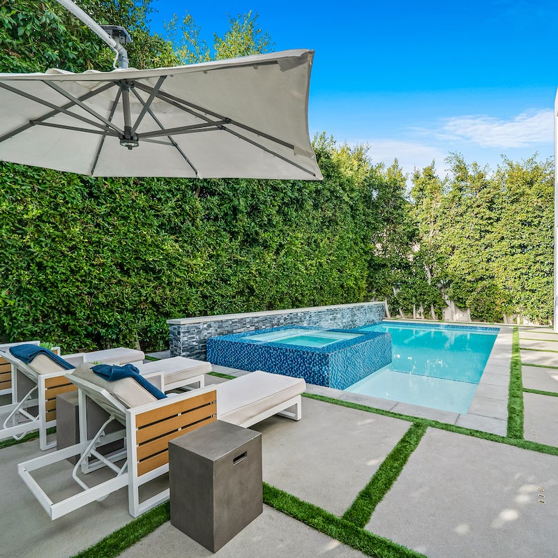 Lounge by the pool in between dips, or spend long evenings luxuriating in the hot tub