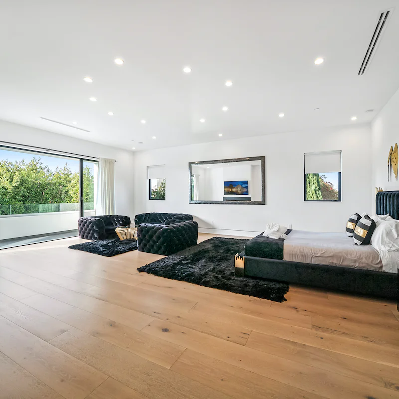 Sleep soundly in the luxurious master suite, complete with seating area, balcony access and vast marble bathroom