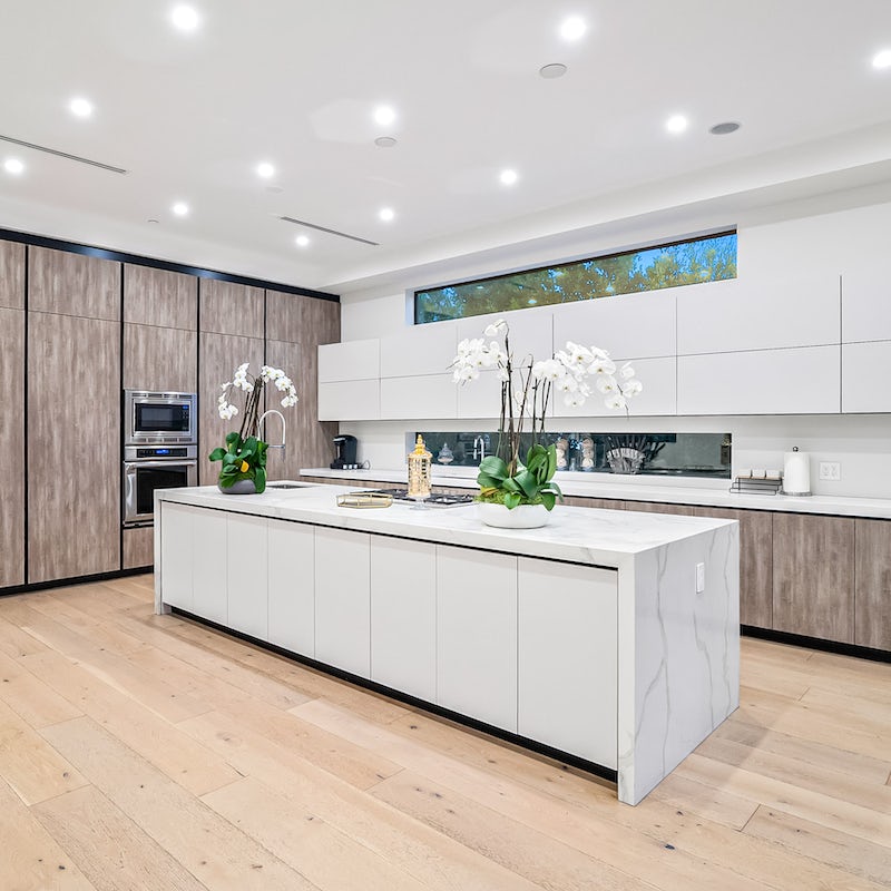 Take inspiration from the clean lines and luxurious natural materials in the kitchen