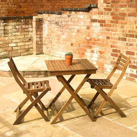 Enjoy a morning coffee out in the sunny private courtyard