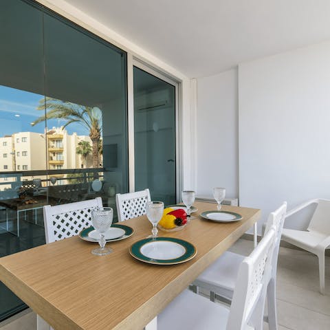 Tuck into breakfast on the roofed balcony and plan your outings
