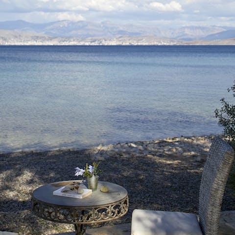 Enjoy a glass of fizz on the beach at the bottom of the garden