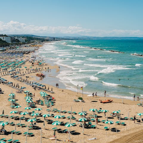 Spend leisurely days down at Sabbiadoro Beach, a twenty-five-minute walk away