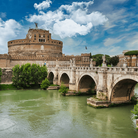 Walk four minutes across St. Angelo Bridge to visit the castle beyond