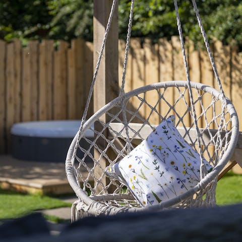 Take a perch in the swing seat and enjoy the peace and quiet of rural Sussex